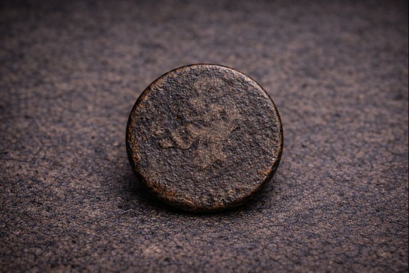 Worn Bronze Coin with Laurel Wreath – thumbnail